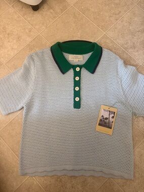 Trovata birds of paradise Light Blue Knit Polo, size medium,NWT, this season